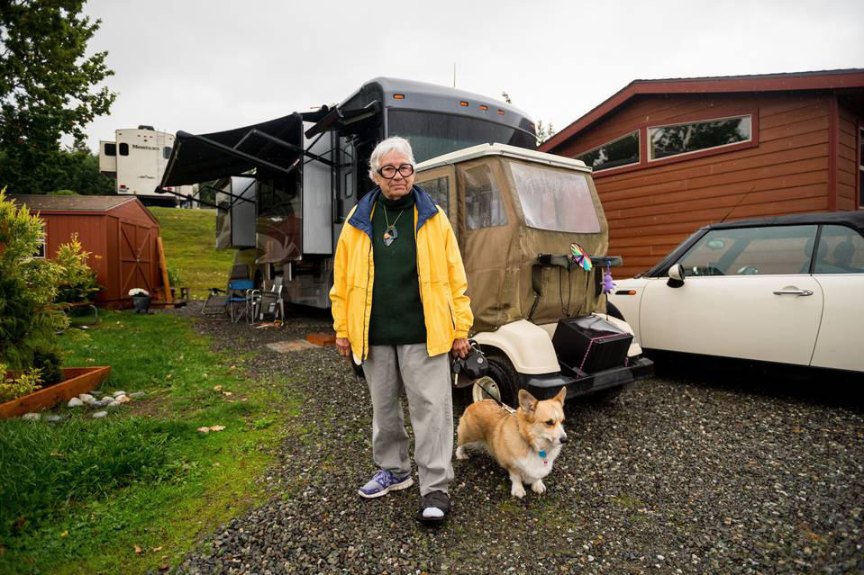 Court-appointed guardians controlled much of 74-year-old Linda McDowell's life for 30 months. A judge ended the guardianship in 2014, and she now lives in her mobile home with her dog, Sam, much of her savings gone. PHOTO: STUART ISETT FOR THE WALL STREET JOURNAL